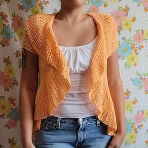 Bright orange crochet cardigan top